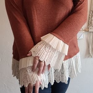 Very cute rust orange top with lace